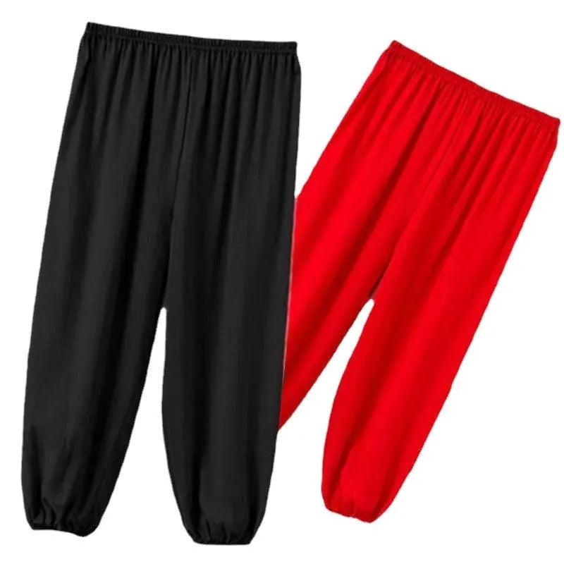 Children's black high-elasticity Sanda practice pants made from lycra and spandex fabric.