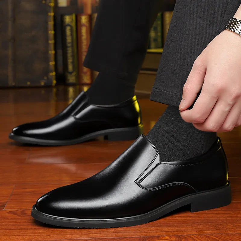 Men's black renewable leather business casual slip-on shoes with rubber sole and leather toe cap.