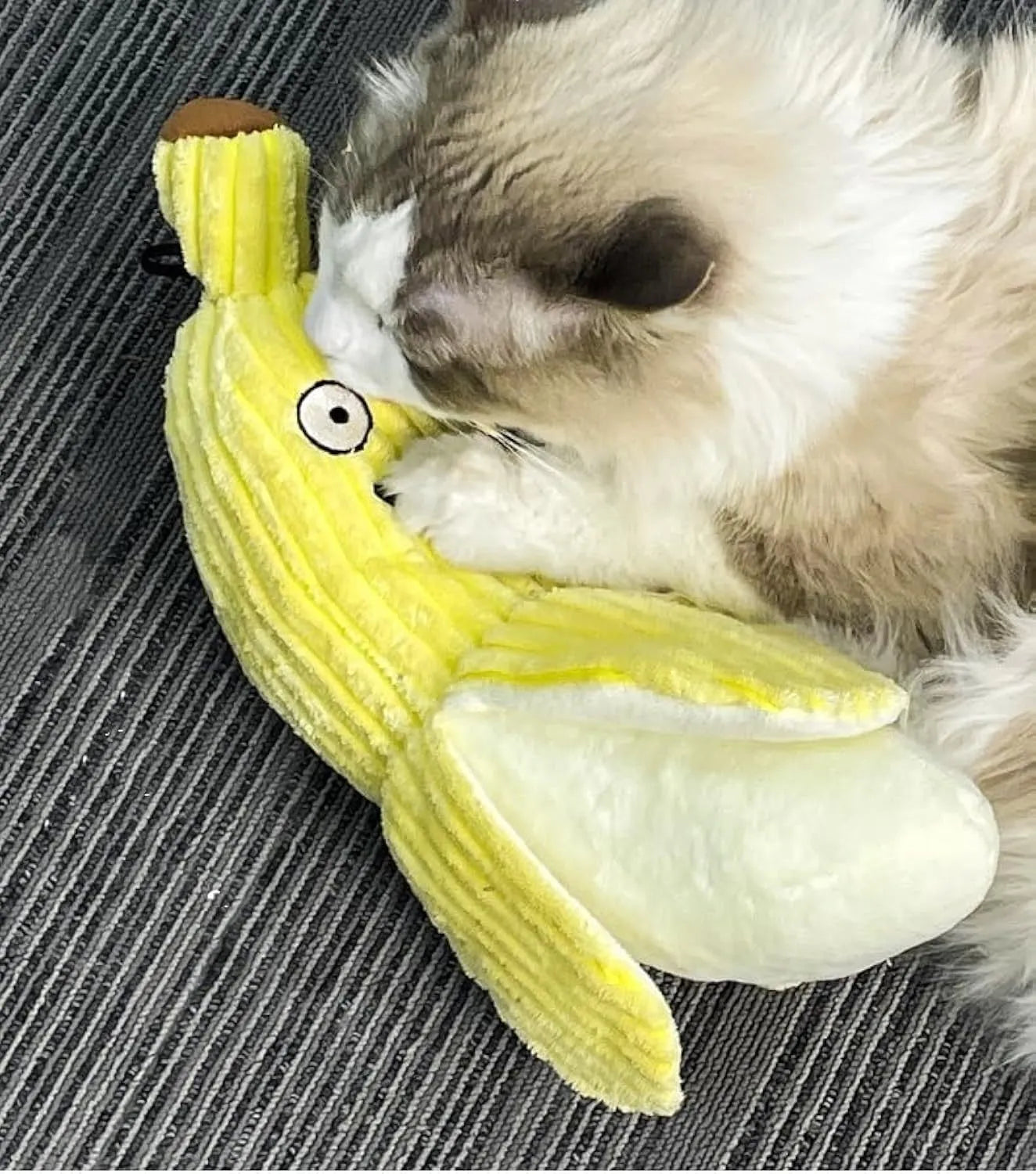 Yellow banana shaped plush cat toy with crinkle sound paper inside.