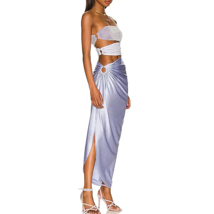 Purple one-piece swimsuit with matching wrap skirt set on mannequin