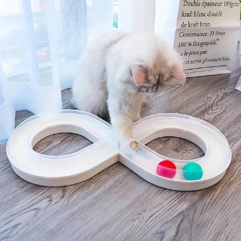 Blue and white cat interactive toy with turntable track ball and teasing stick on flat surface