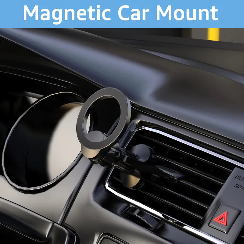 Black magnetic car phone holder with O-ring bracket attached to vehicle air vent holding smartphone