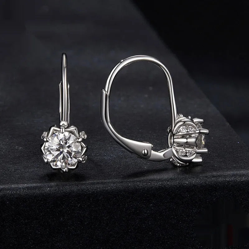 Sterling silver flower bud ear clip with white gold plating and moissanite stones