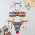 Women's halter-neck bikini swimsuit with brief bottoms in polyester fabric