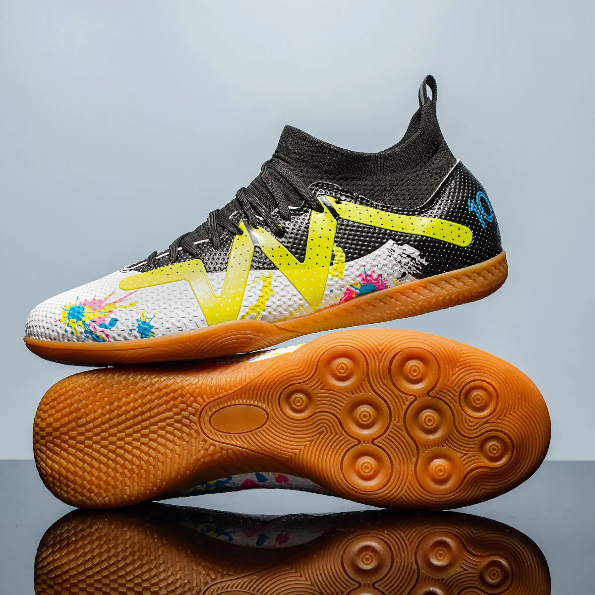 Football boots with removable moulded studs in black and yellow colour option