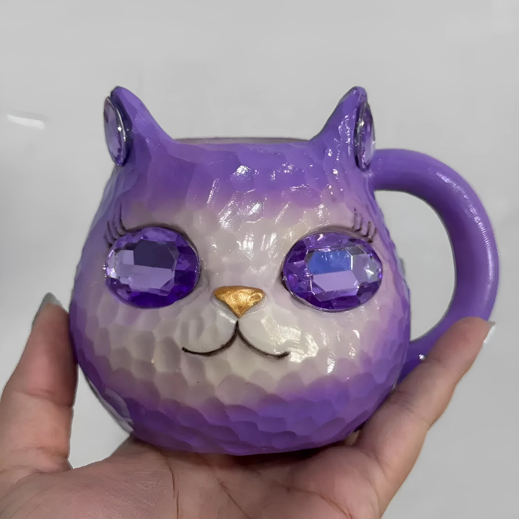 Resin cat cup gift with crystal Earth globe in blue, green, pink, or purple colour options.