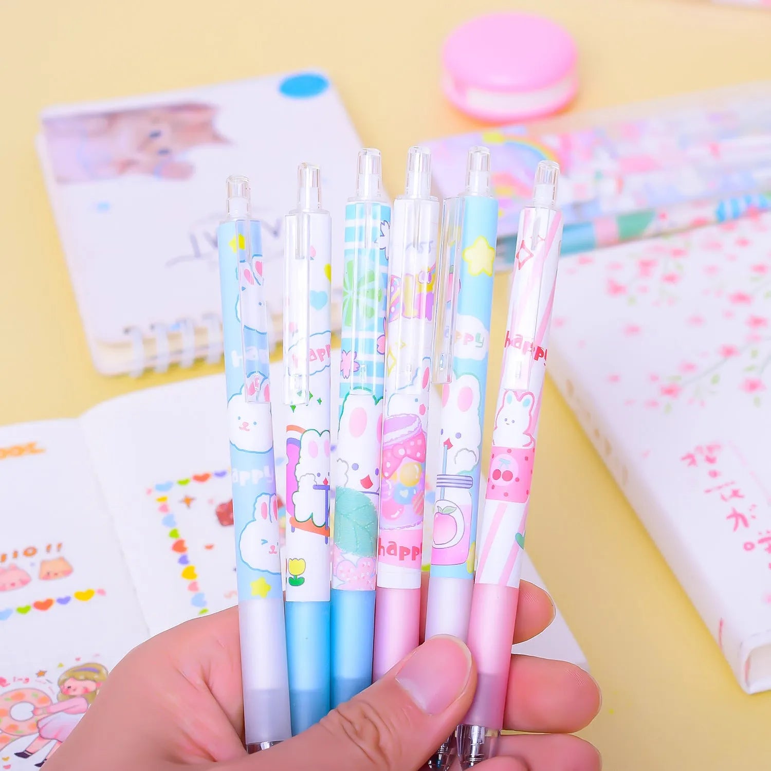 Cartoon bunny themed 0.5mm black ink pen set with six plastic shell pens for student stationery
