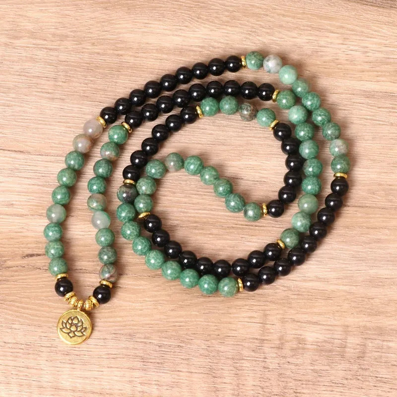 Green and black elastic beaded bracelet made from alloy material with natural styling