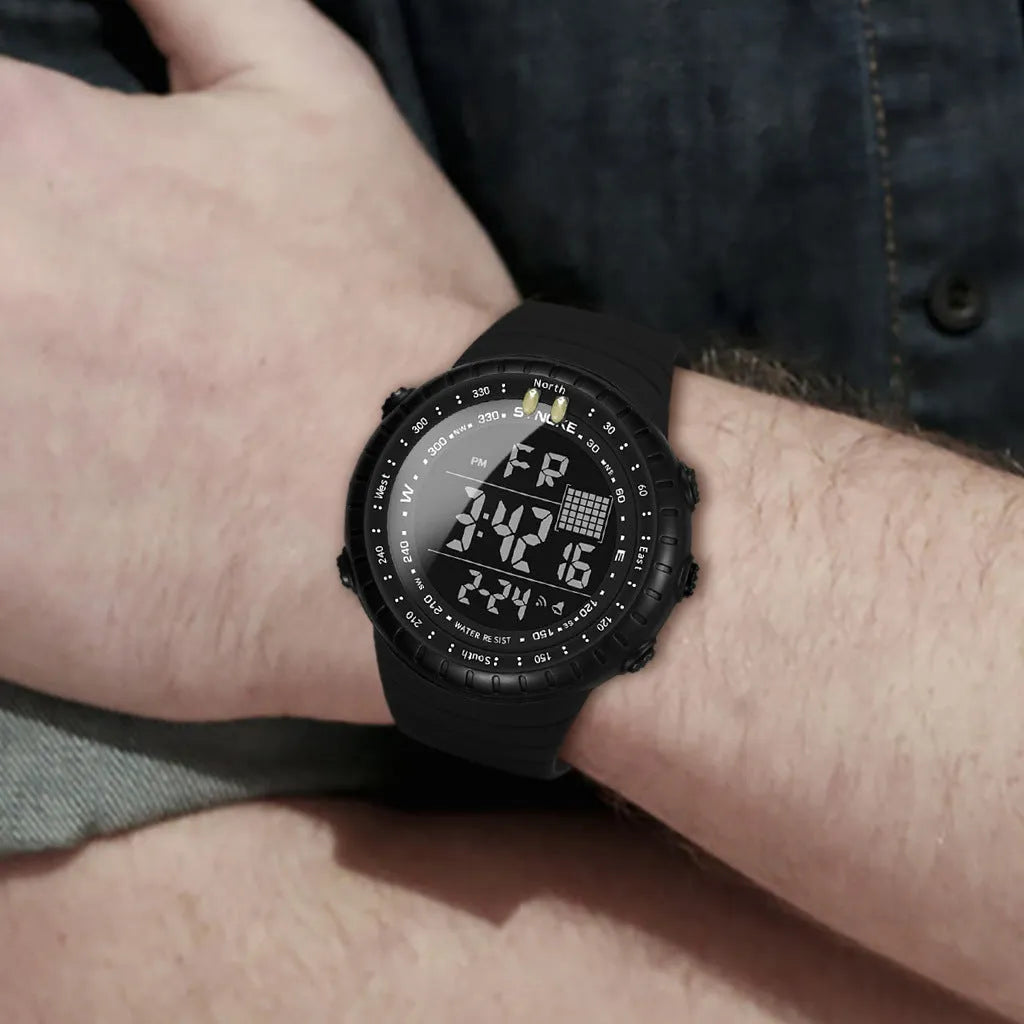 Men's black waterproof digital watch showing large 54.74mm dial and adjustable PU strap