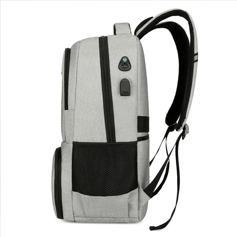 Light grey Oxford cloth insulated picnic backpack with curved shoulder straps showing dry-wet separation compartments
