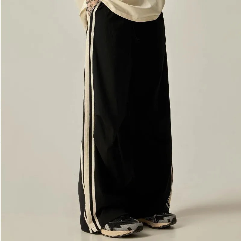 Black men's climbing trousers with high waist and wide straight-leg design