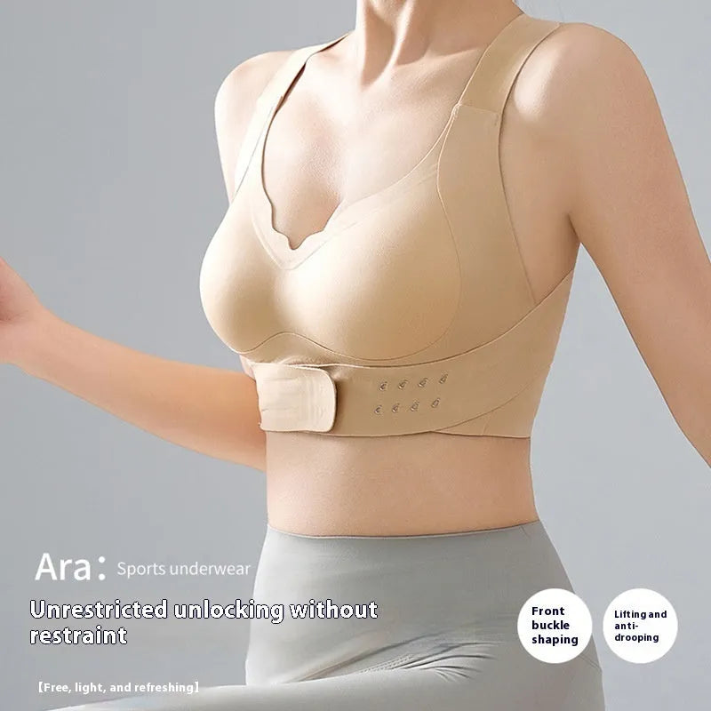 Women's black sports bra with front buckle fastening and back shaping design