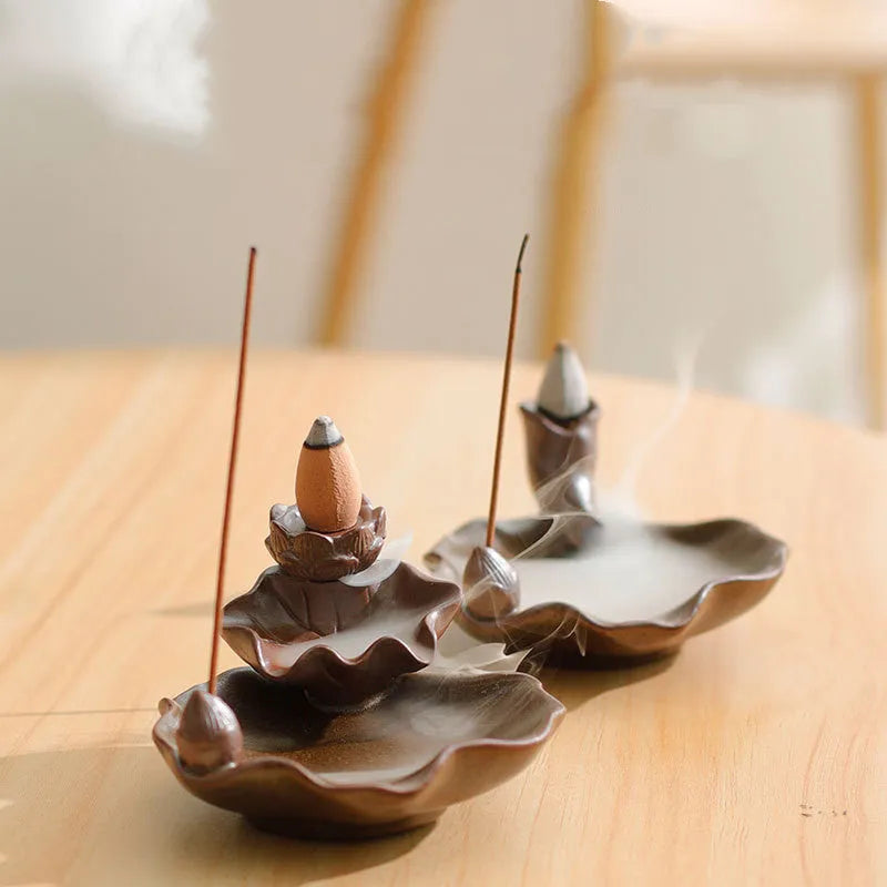 Square purple clay ceramic incense burner with lotus and plum blossom motifs
