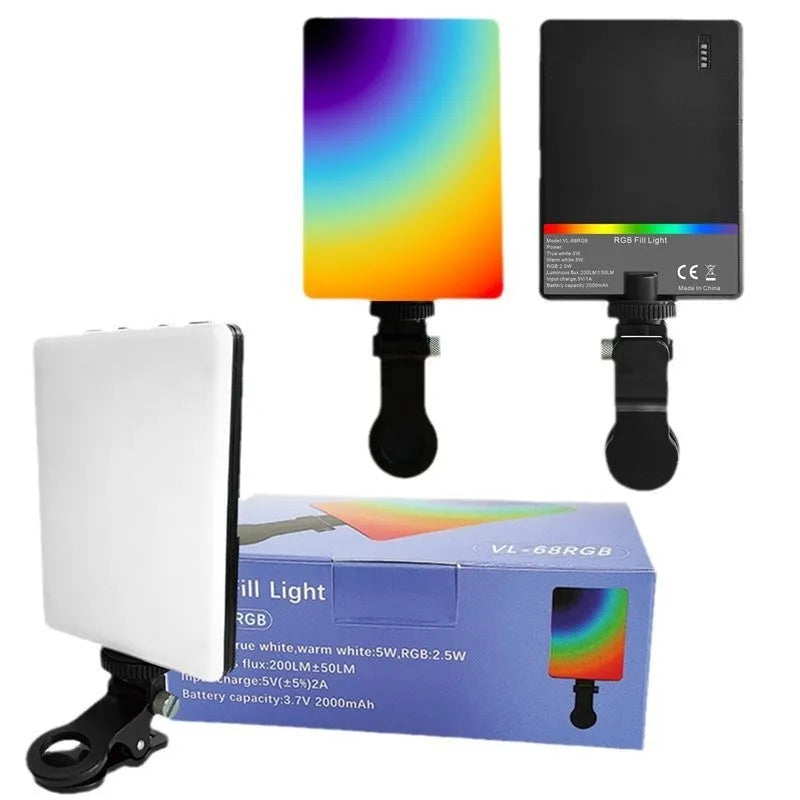 Pocket-sized handheld LED fill light with clip, shown next to a mobile phone for scale.