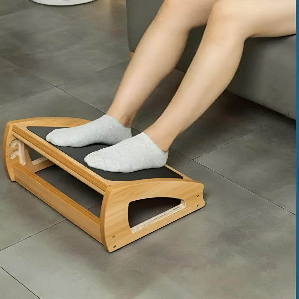 Wooden bamboo office desk footstool with minimalist design in natural wood colour.