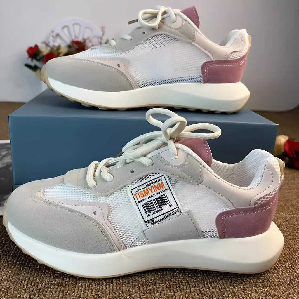 Women's grey and pink retro sneakers with low-top design and rubber sole