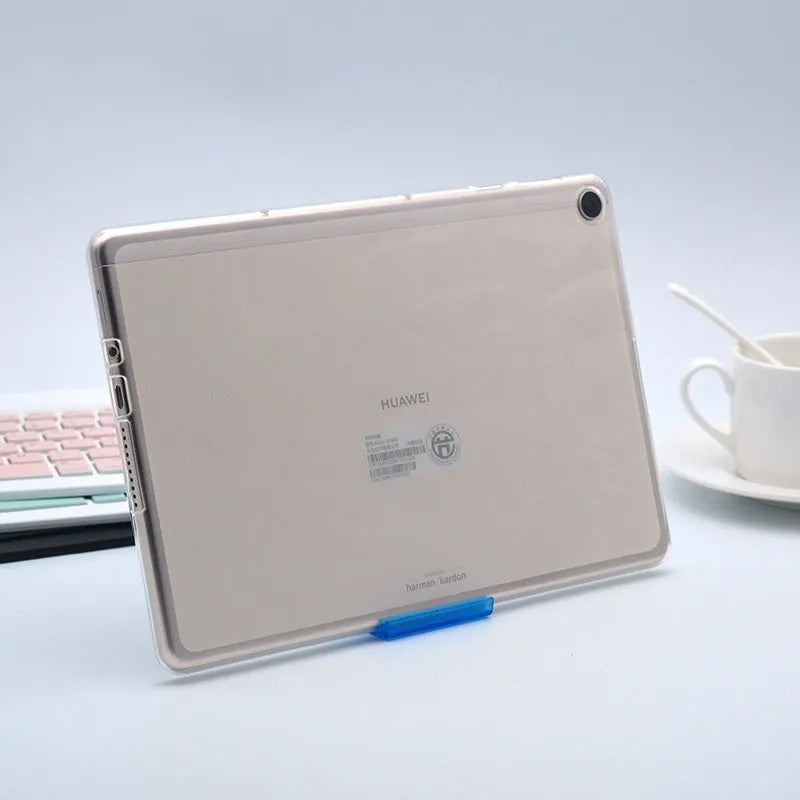 Clear transparent ultra-thin silicone hard shell case for a tablet on a flat surface.
