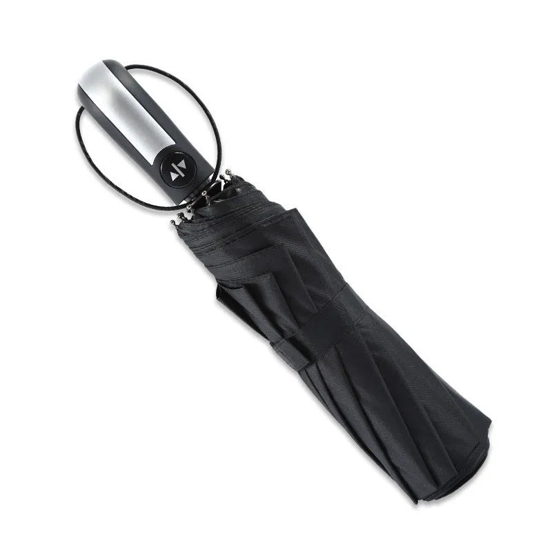 Large black automatic triple-fold business umbrella with steel ribs and rubber handle