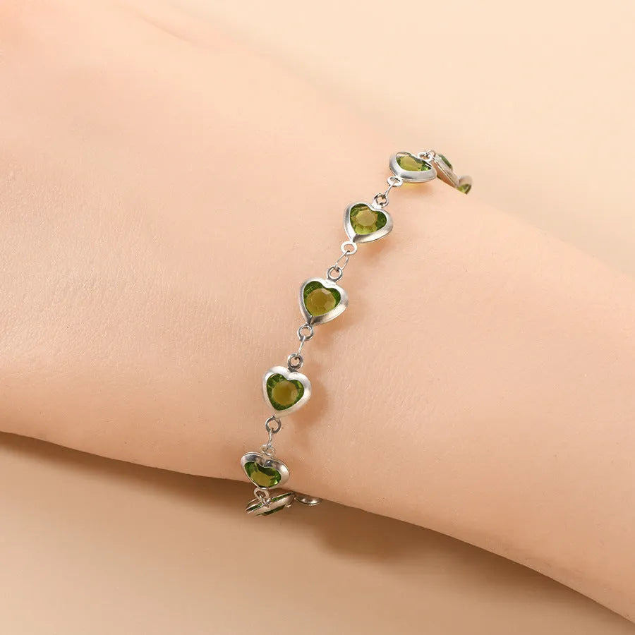 Devil's Eye creative heart stainless steel bracelet in colourful, royal blue, dark green, red, light green, and light blue options