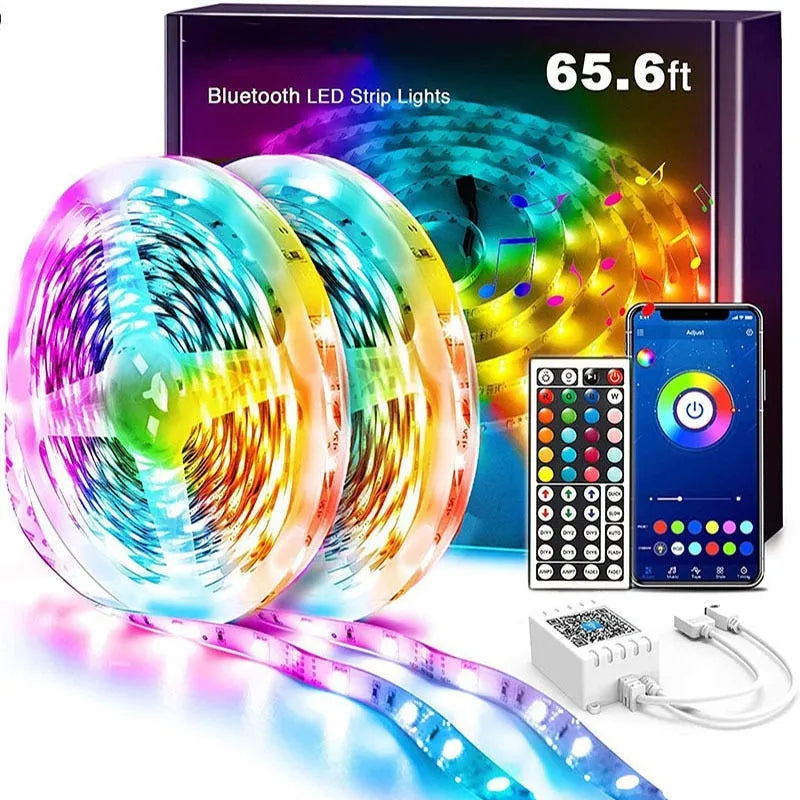 12V RGB LED light strip coil with Bluetooth remote control and power adapter on a white background.