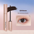 Long curling mascara tube in black or brown colour for long-lasting definition.