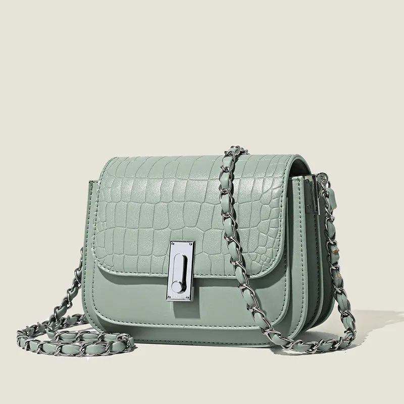 Women's black PU leather crossbody shoulder bag showing horizontal square shape and outer sandwich pocket