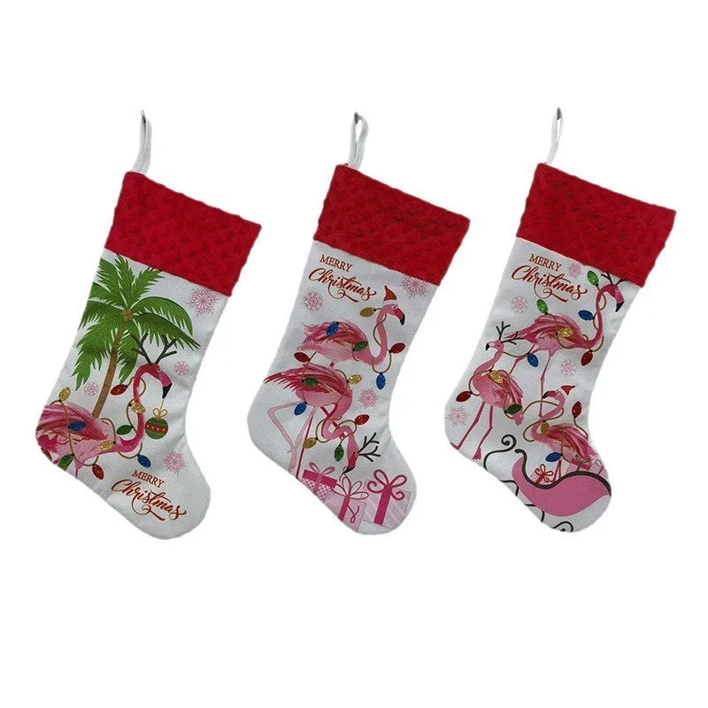 Flamingo patterned cloth Christmas stocking decoration measuring 46 by 28 centimetres.