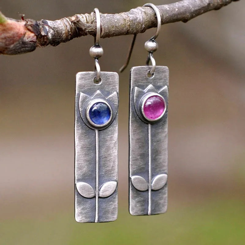 Antique finish geometric earrings with red sapphire stones on electroplated metal