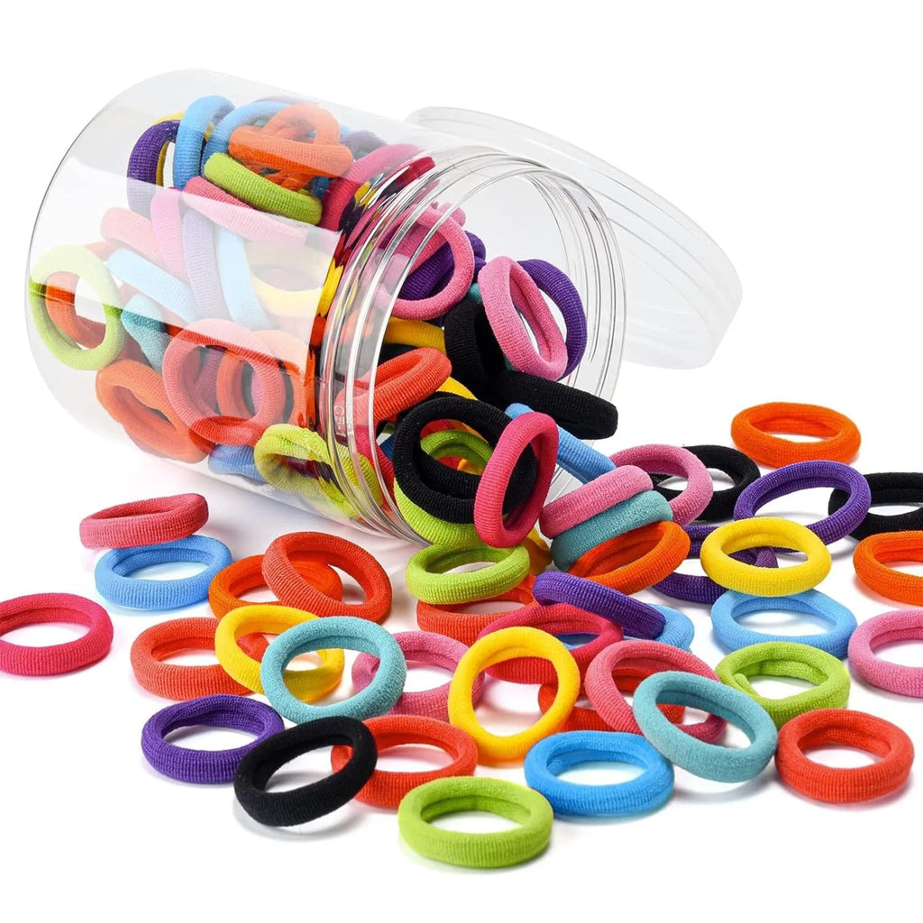 100 seamless cotton baby hair ties in 10 mixed colours displayed in small jar packaging