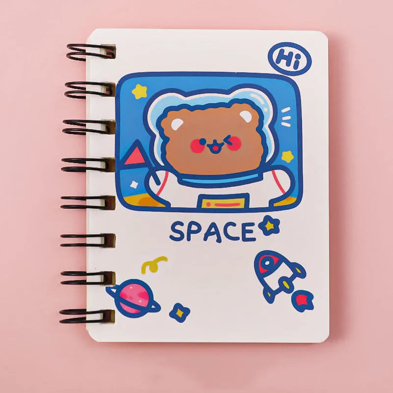 Astronaut themed pocket notebook showing 10.5 x 8 cm dimensions with space decoration