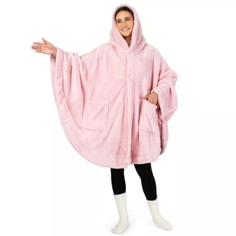A thick pink hooded bathrobe with long sleeves and a cardigan-style front, laid flat.