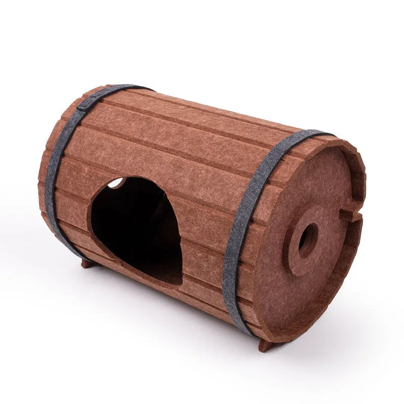 Assembled wine barrel pet bed for cats with soft interior, shown alongside its three flat felt panels and two binding straps.
