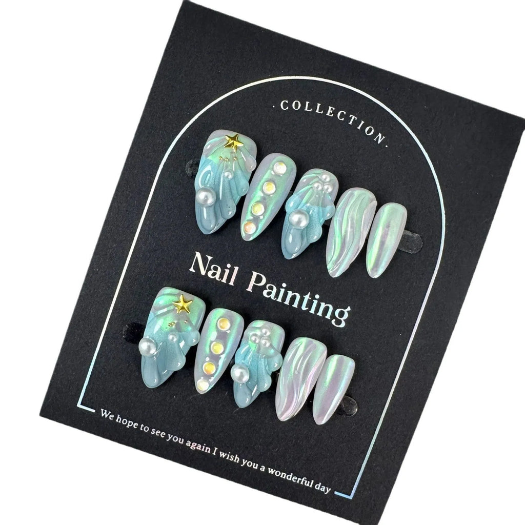 Blue summer design plastic false nail stickers in XS, S, M, L sizes.
