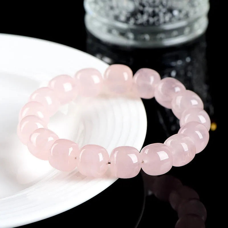 Pink crystal and natural bamboo bracelet with 11x12mm barrel-shaped geometry beads