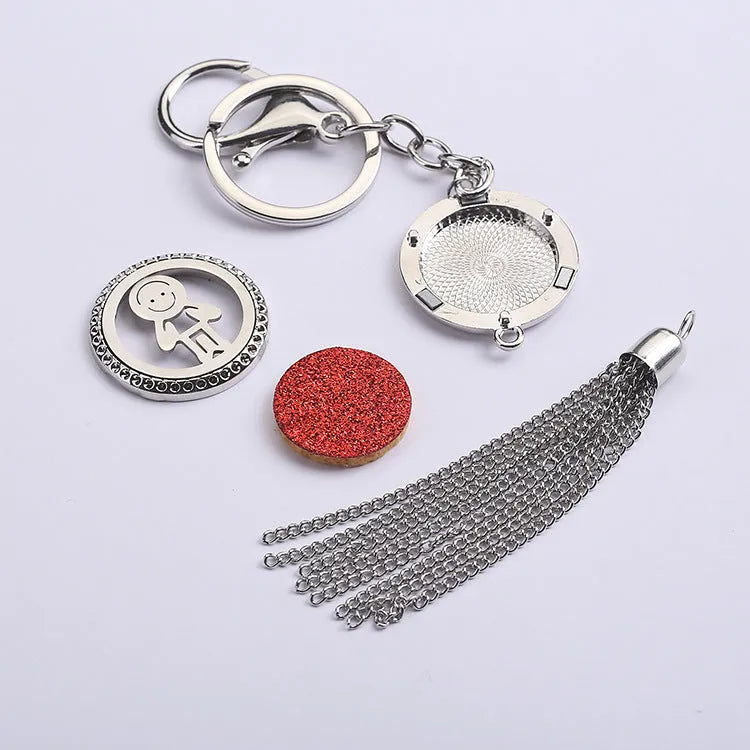 Alloy tassel car pendant air freshener hanging from a rear-view mirror on a 50cm chain