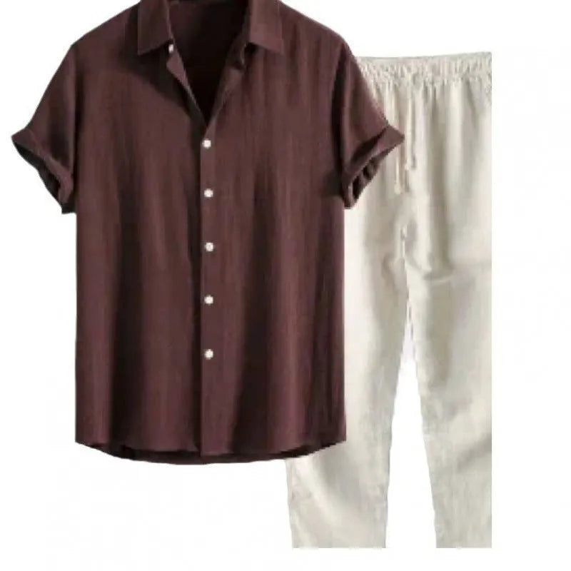 Man wearing a loose-fit linen-blend short sleeve shirt and matching casual trousers from a co-ord suit set.