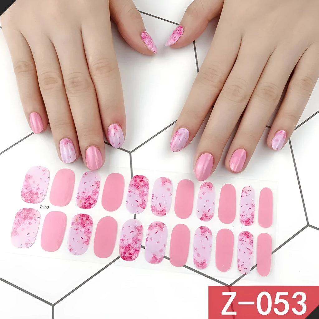 Korean nail sticker set showing 22 decals with cartoon, floral, and bow patterns alongside a nail file.