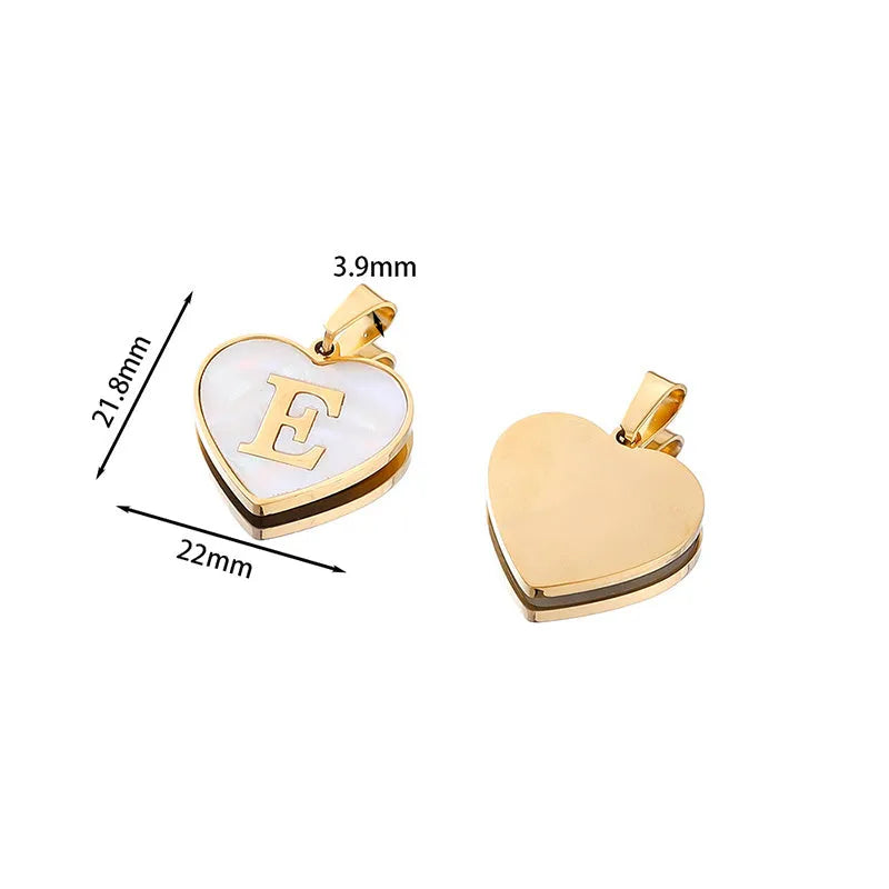 Gold plated heart necklace with white shell detail on an adjustable chain