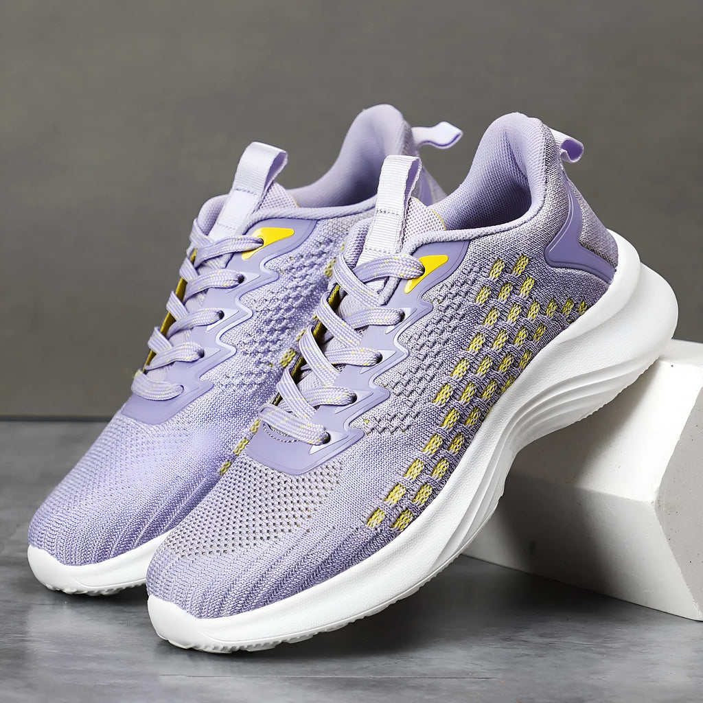 Women's lavender purple Flyknit running shoes with mesh lining and striped pattern