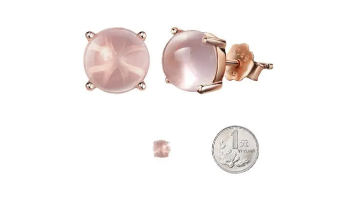 Women's rose gold drop shape stud earrings with crystal inlay detail