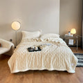 Polyester thermal flannel blanket in beige colour, folded to show texture, for winter bed use.