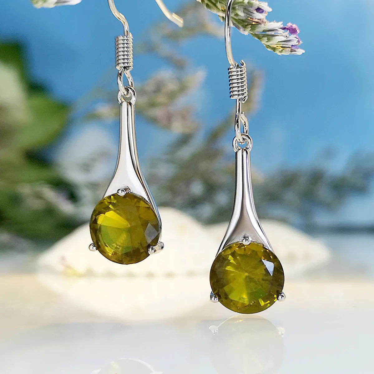 Olive green drop shape fashion earrings with a retro minimalist style.