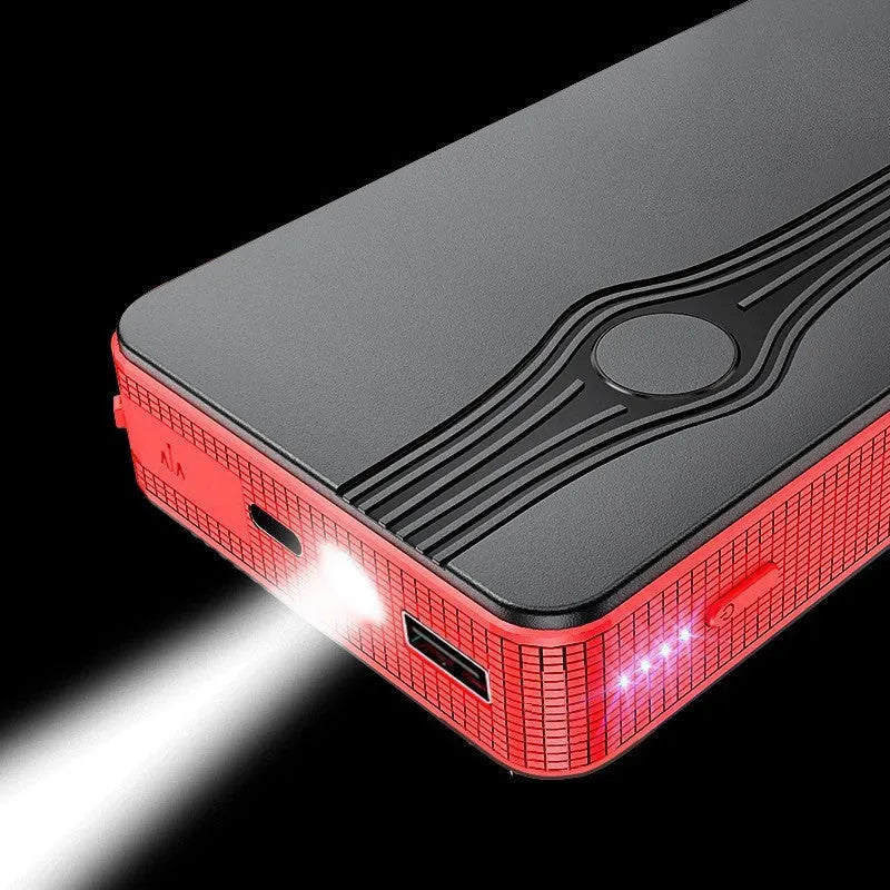 Red K4-E automobile emergency jump starter and power bank unit with data cable.