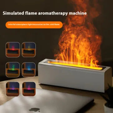 Black square USB aroma diffuser with colourful flame light effect and mist output on a wooden table.