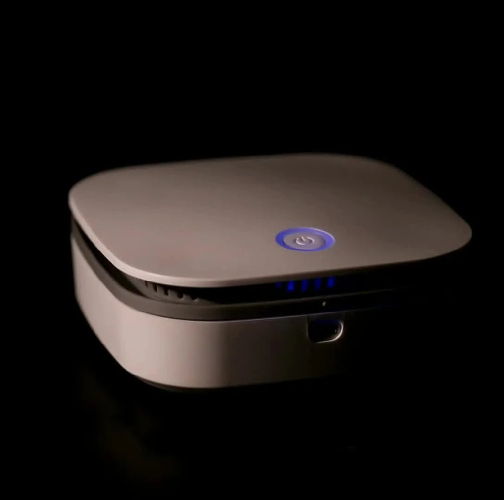 White USB-powered air purifier with button control for car and small room use.