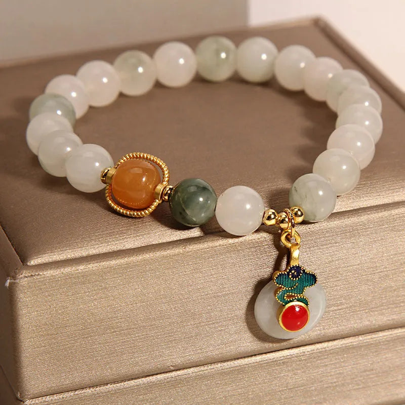 Women's adjustable ice jade bracelet with pearl accents and xiangyun jade buckle