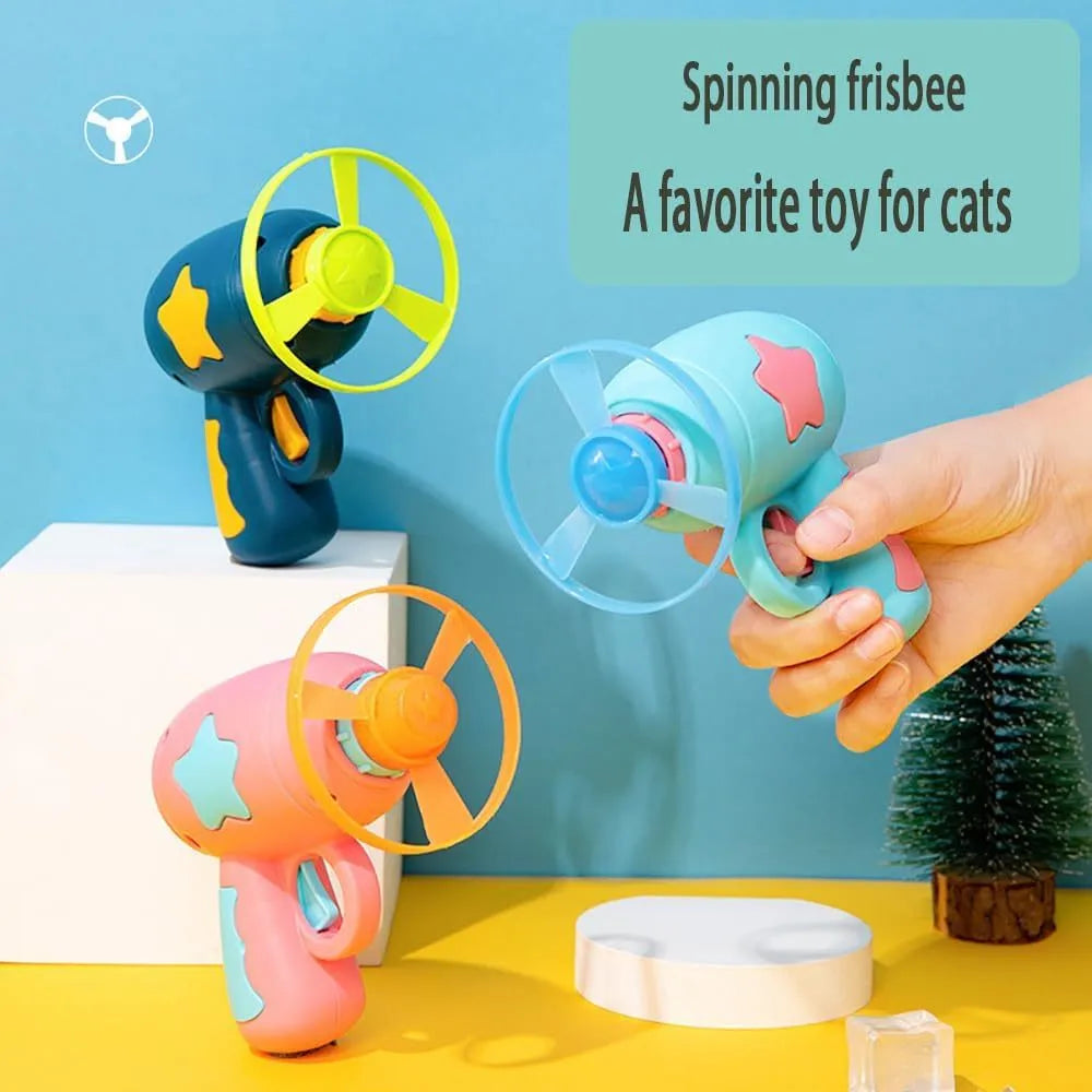 Blue or pink plastic cat toy gun with two Frisbee discs for indoor play.