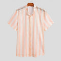 Pink men's loose-fit cardigan shirt with short sleeves and a waffle-textured fabric.