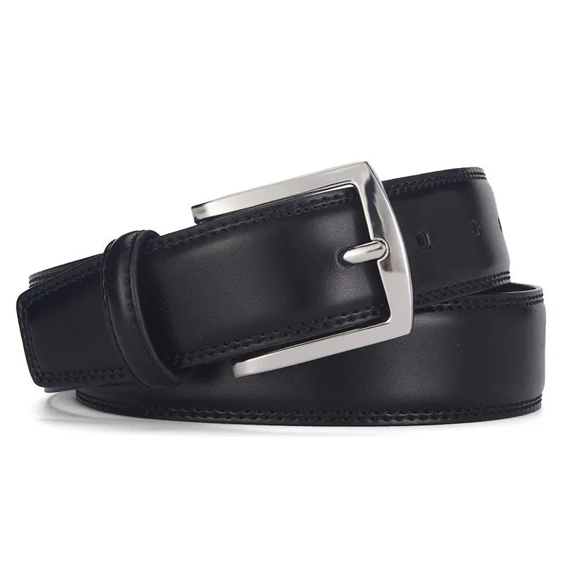 Men's classic black genuine leather belt with a silver-toned alloy pin buckle on a flat surface.