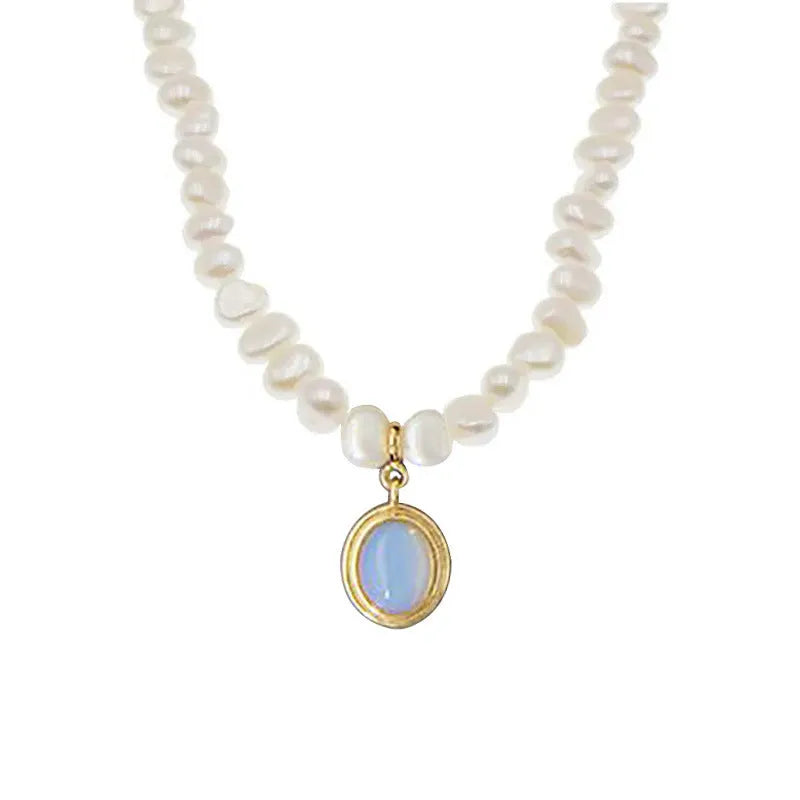 Geometric pearl silver necklace with irregular pearls and adjustable length on white background